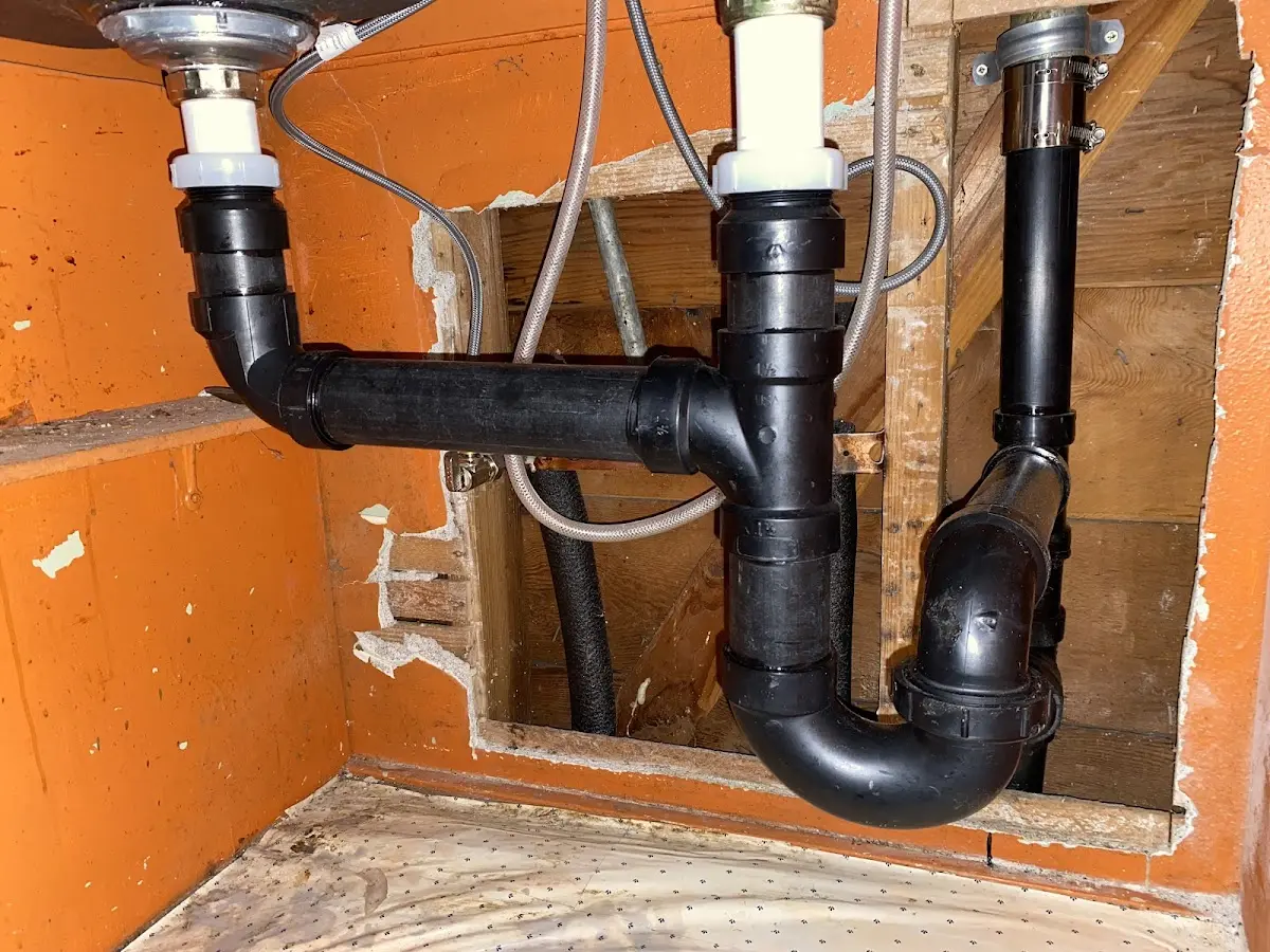 Professional Garbage Disposal Repair equipment and tools on the job in Kennedale